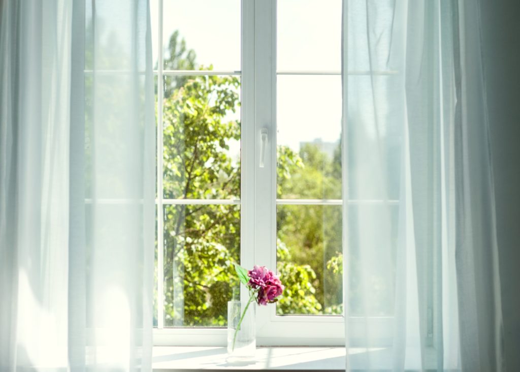High Kitchen Window with Curtains