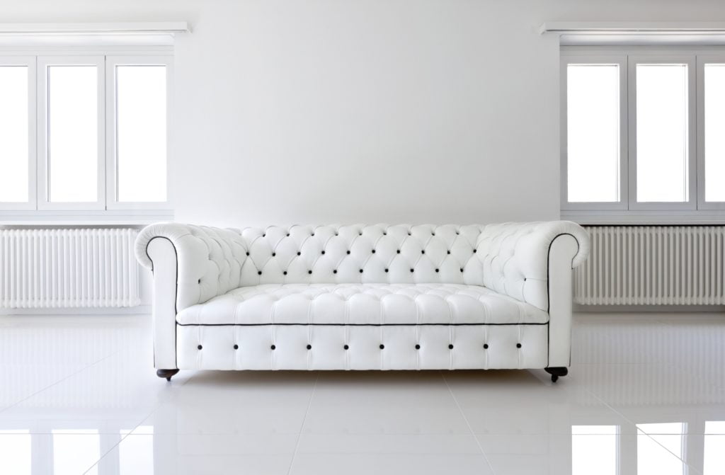 Sophisticated White Leather Sofa in Sleek, Sculpted Style