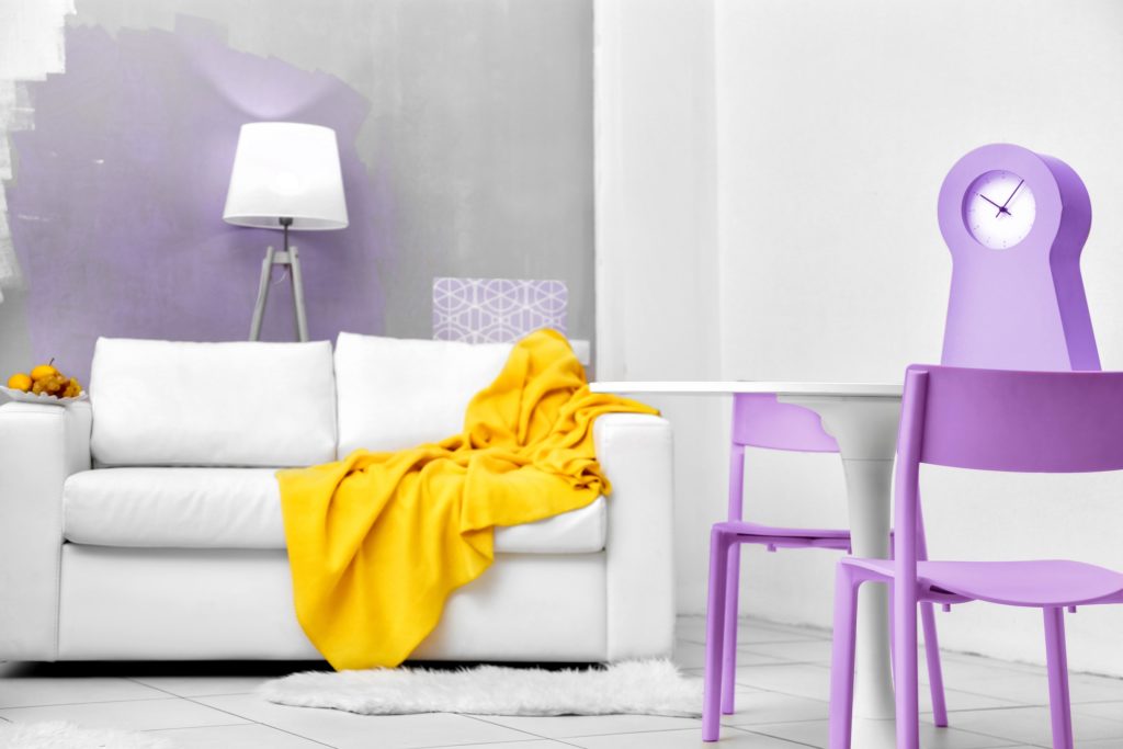 White and Grey Living Room with Folding Violet Accent Chairs