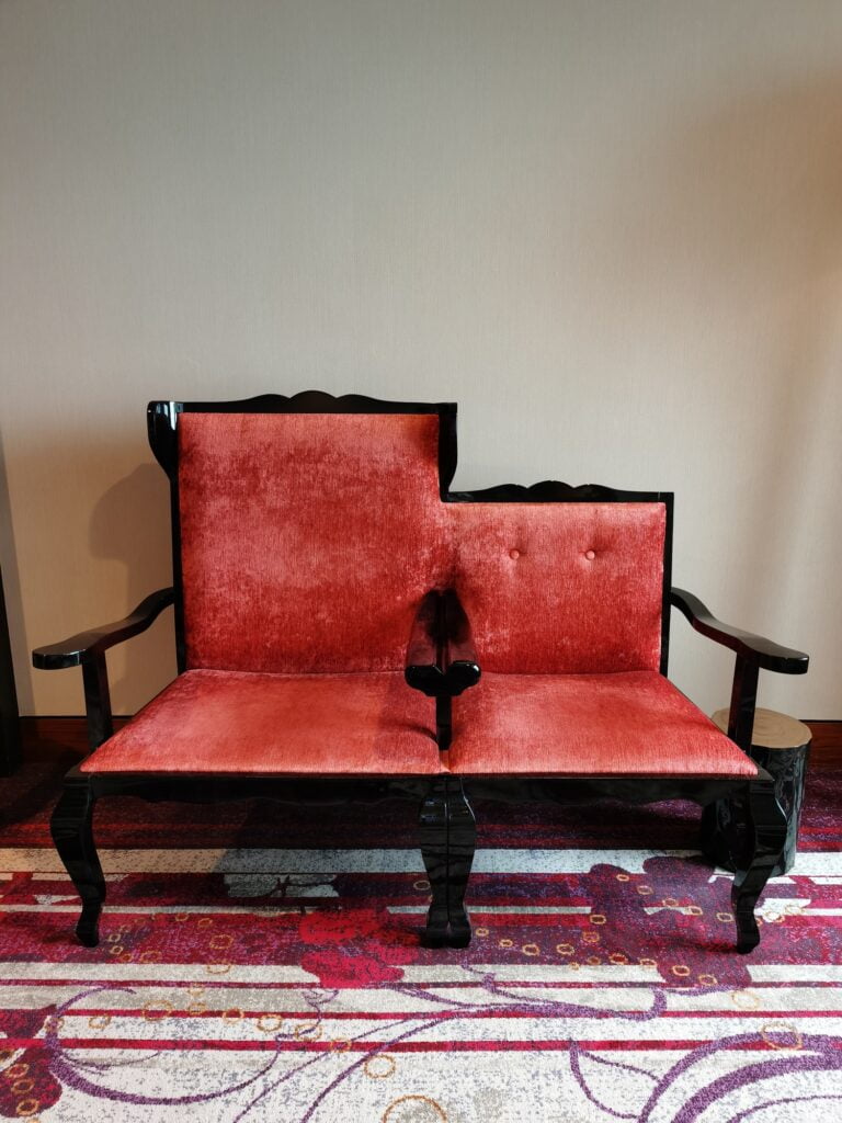 Contemporary Casual Chic Red Sofa with Abstract Expressionist Rug